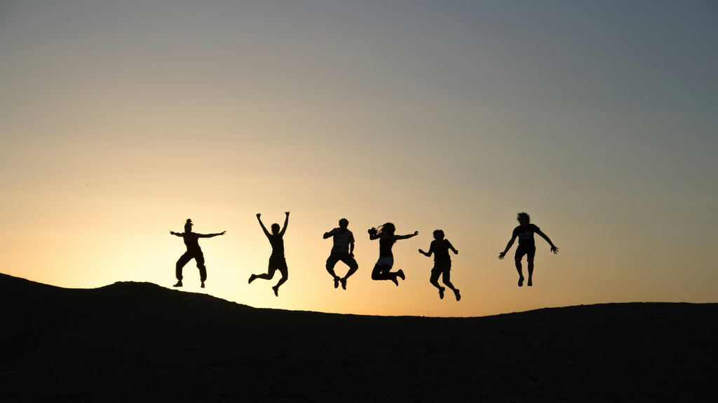 a person standing in the middle of a desert