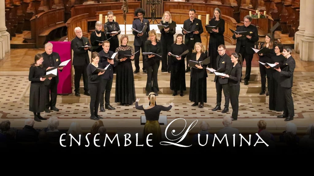 an empty auditorium with a chalkboard and chairs