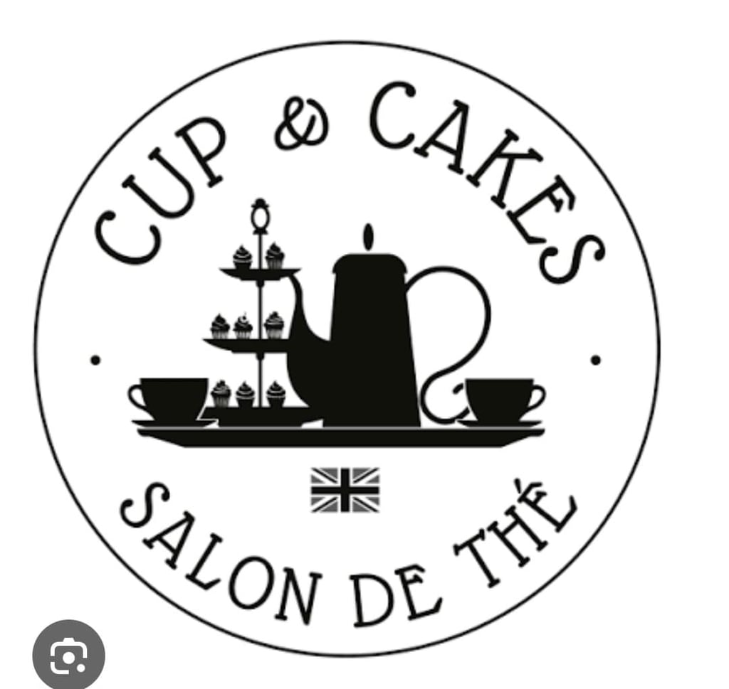 Save the date text on the cappuccino holding hands on a restaurant table