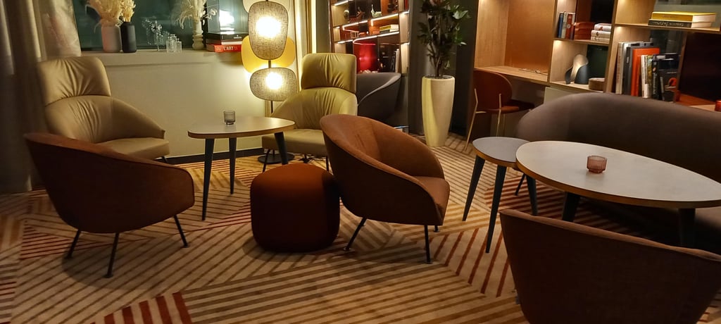 Cafe with outdoor seating on a parisian street.