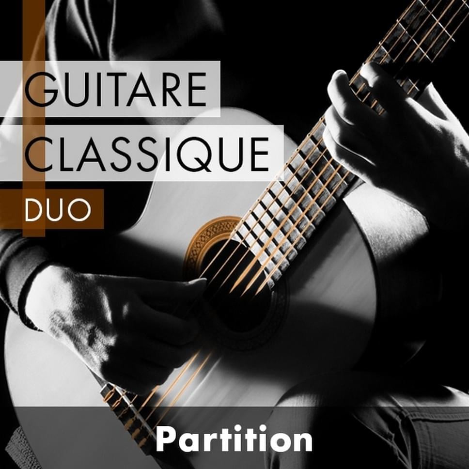 Two men sitting on a stage playing guitars