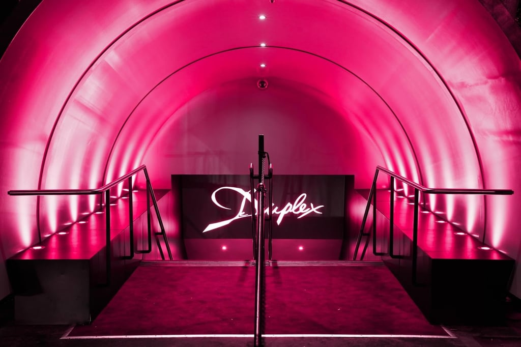 Couple dancing at a wedding reception with sparklers