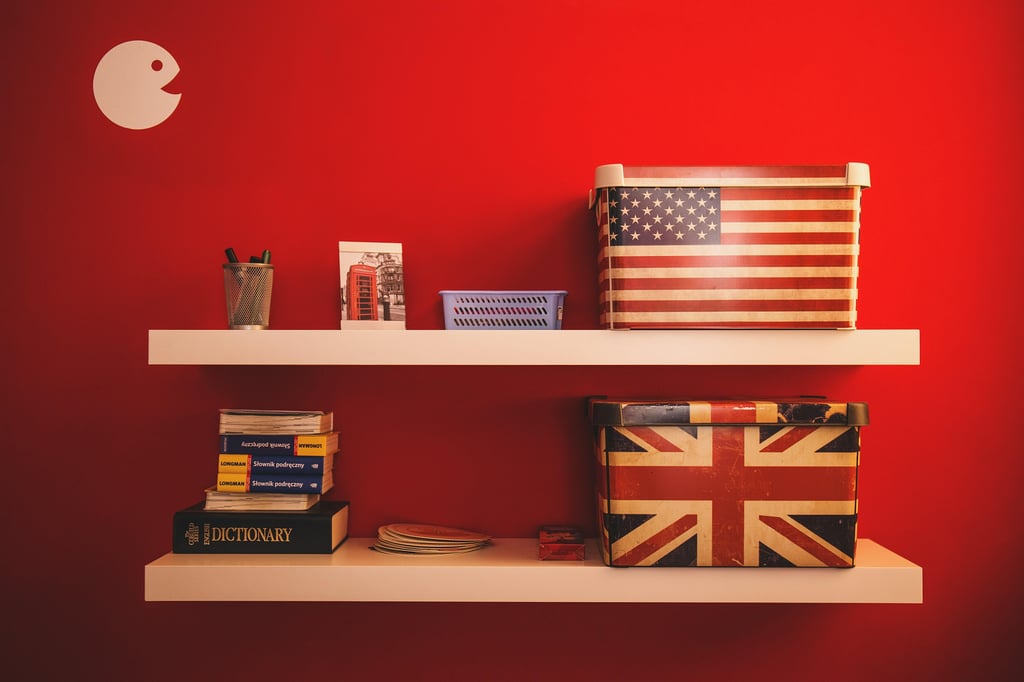 a british flag pin sitting on top of a white wall