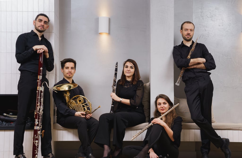 A sheet of music sitting on top of a piano