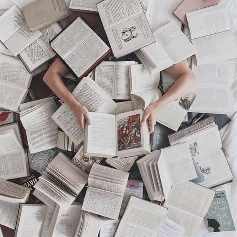 a book open to a page with a page that has a picture of people on it