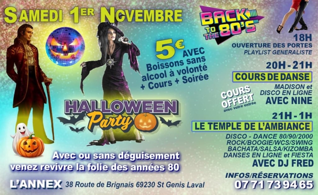 a table topped with candles and pumpkins next to a window