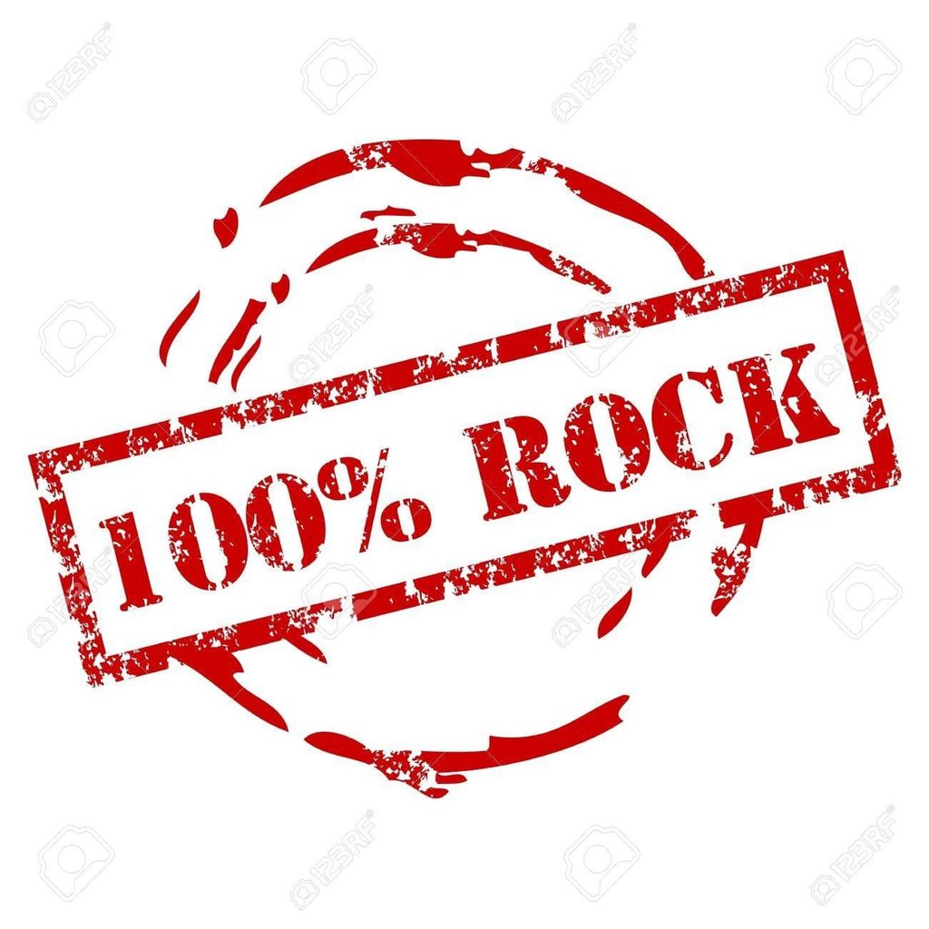 a group of people dancing in a dark room with lights