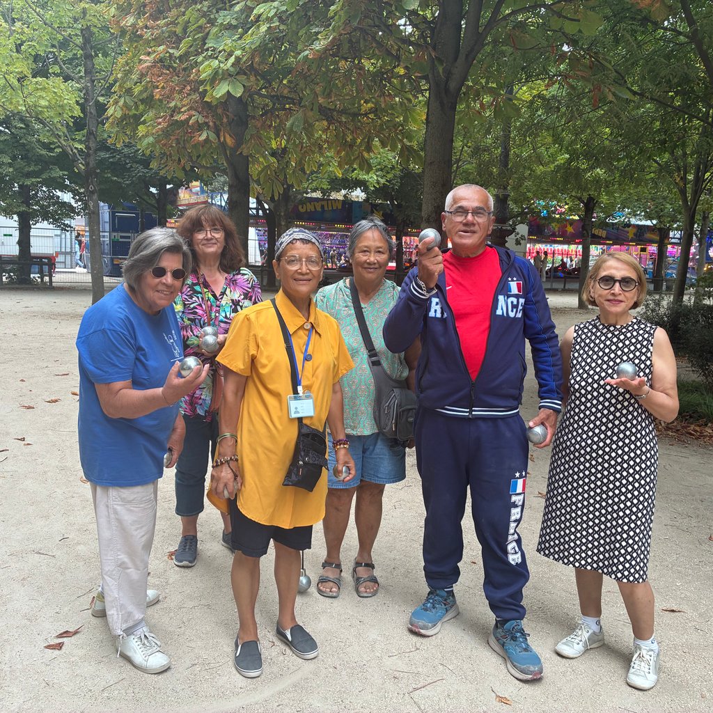 a group of people standing outside of a building