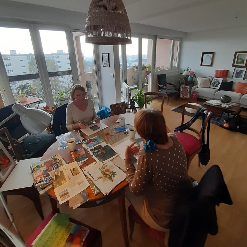 a collage of pictures and words on a white wall