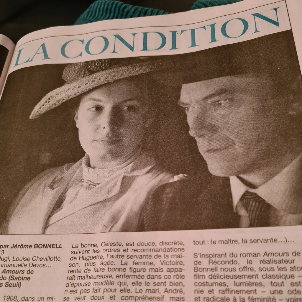 A nurse checking a patients MedicAlert ID bracelet before going into surgery.