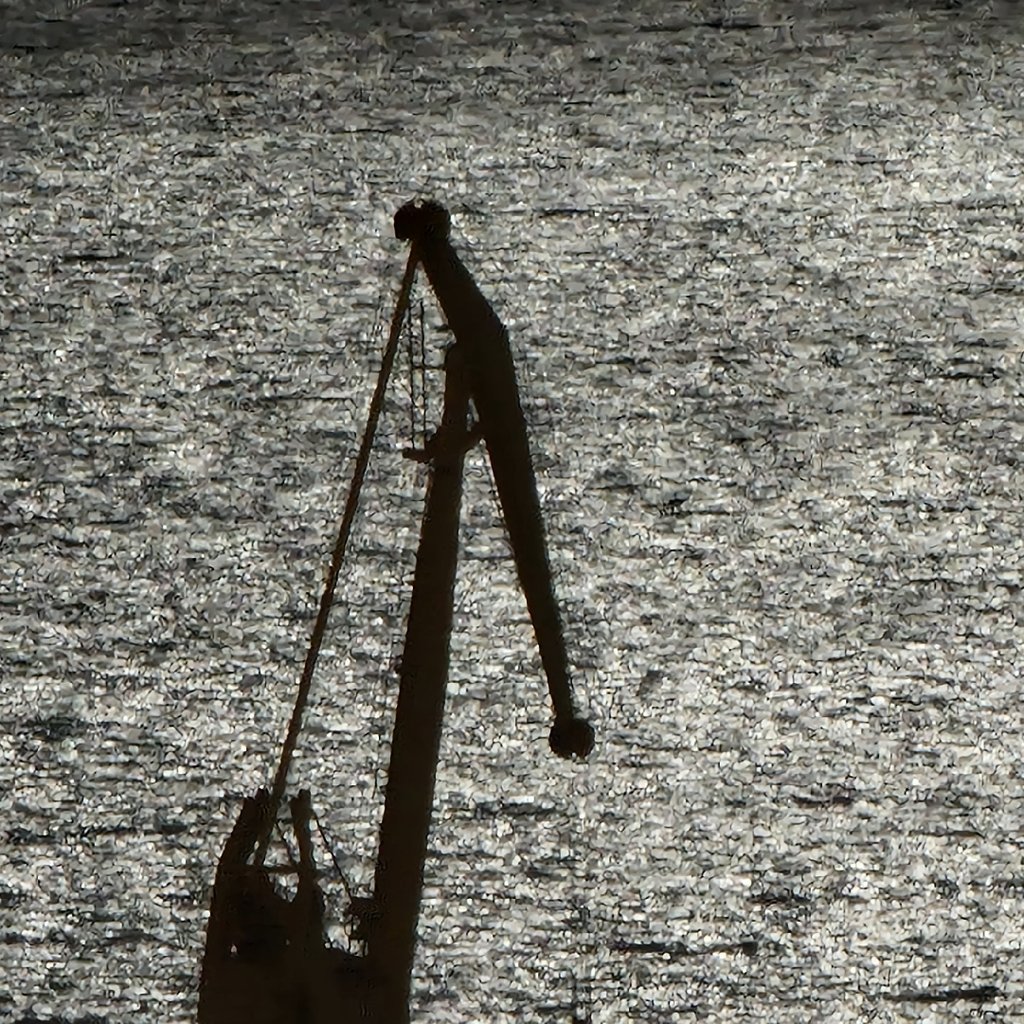 Neon sign reads pause 0 paradis above table