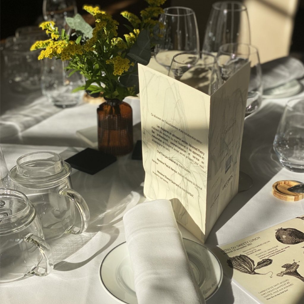a table with a white table cloth on it