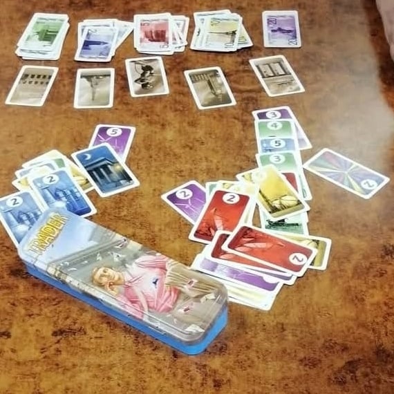 People are playing a game of mahjong together.