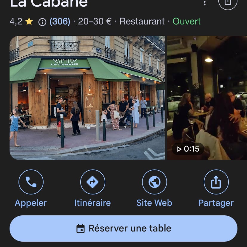 wooden house on green hill under cloudy sky