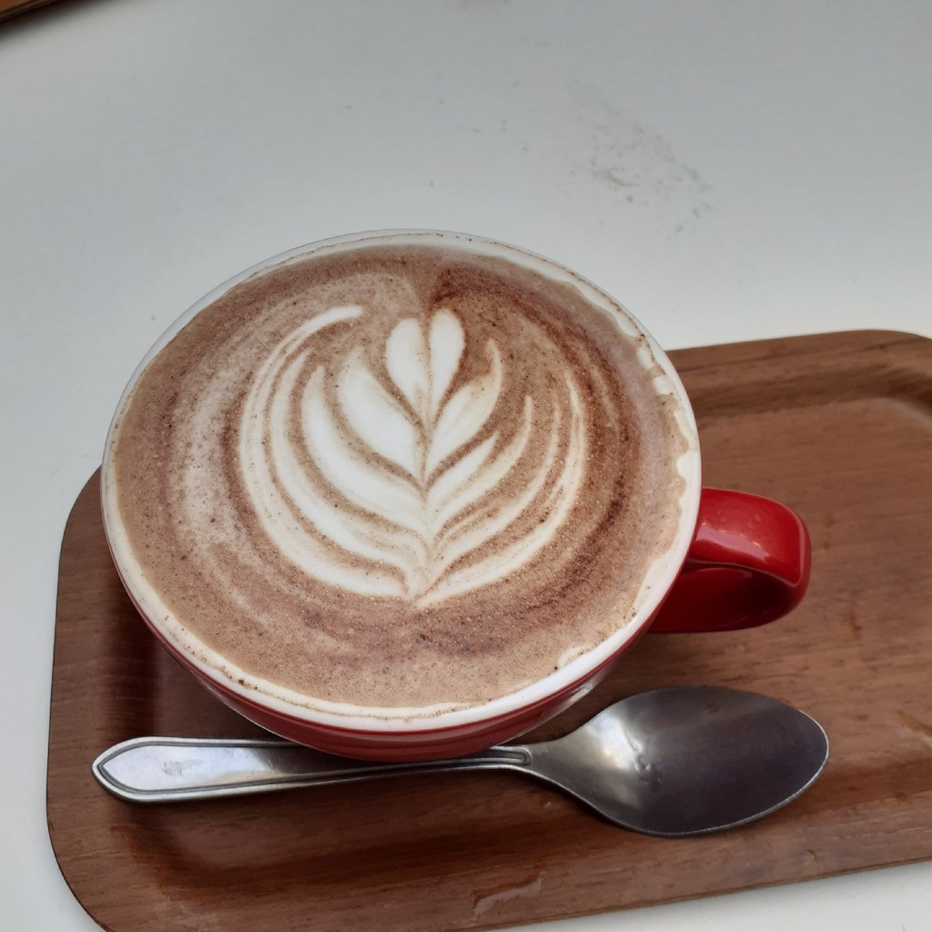 a street sign sitting on the side of a road