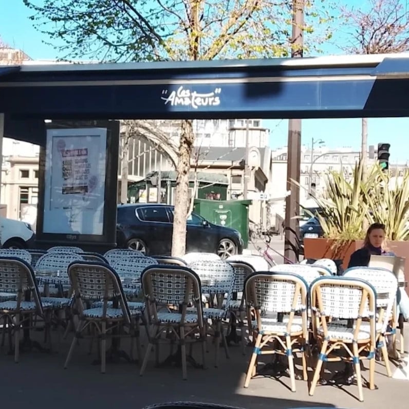 Paris streetview Montmartre cafe with pink flowers