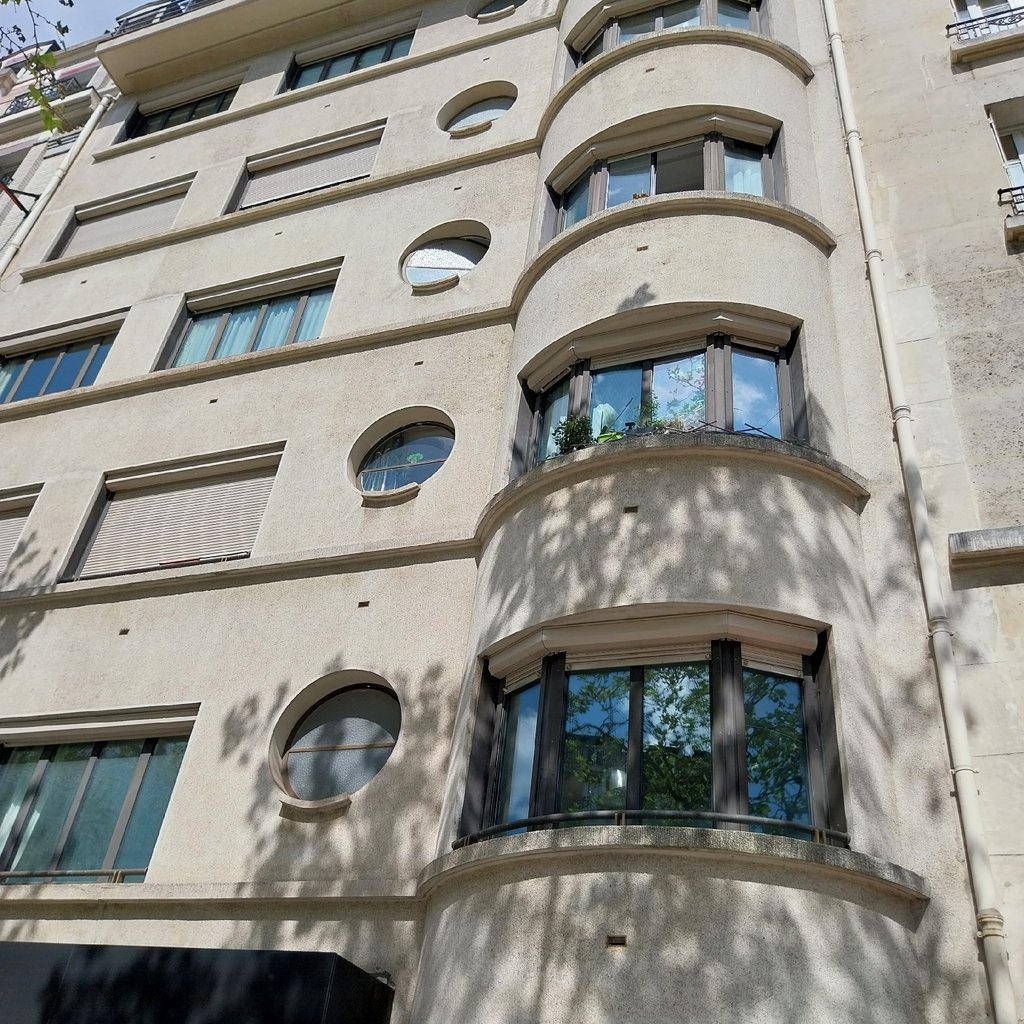 a close up of a building with a clock on it