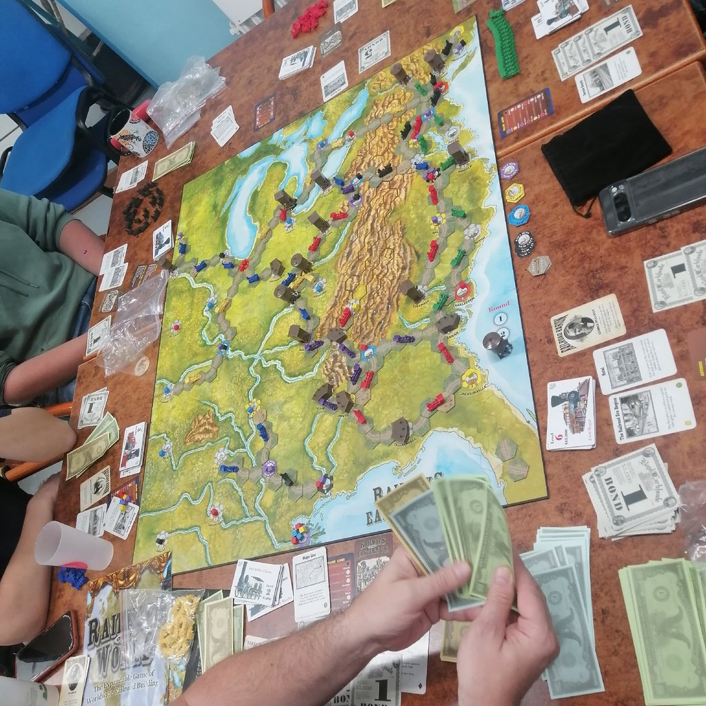 People are playing a game of mahjong together.
