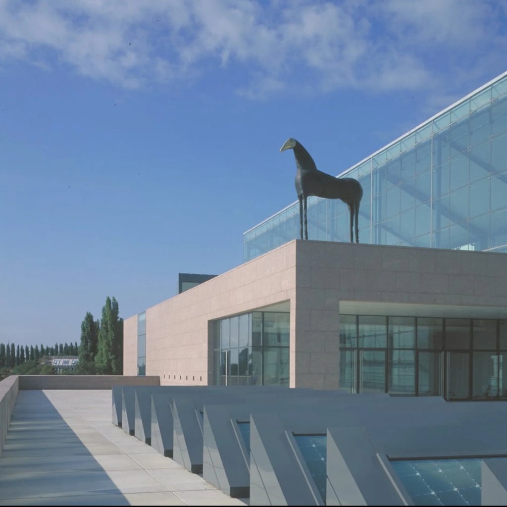Picture taken at a garage exhibit at LACMA. Vintage coffee cans.