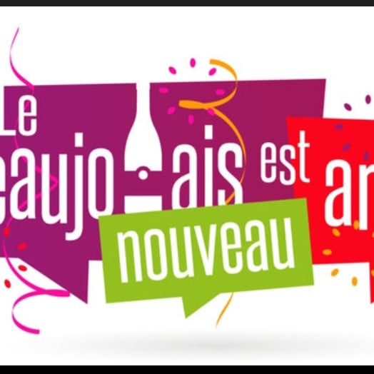 a chess board sitting on top of a wooden table