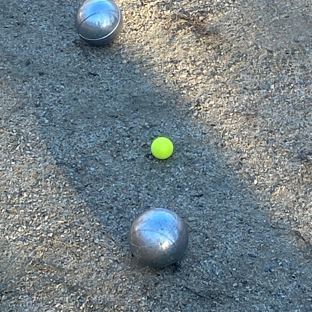 a large building with a fountain in the middle of it