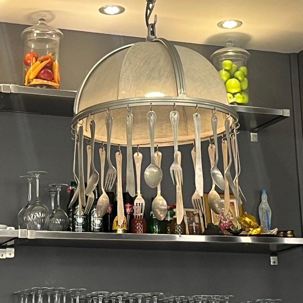 white swan on water during daytime