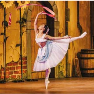 A group of women in white dresses and hats