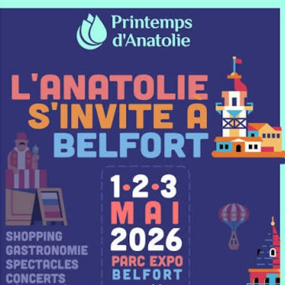 Cherry tree in meadow with dandelions in spring