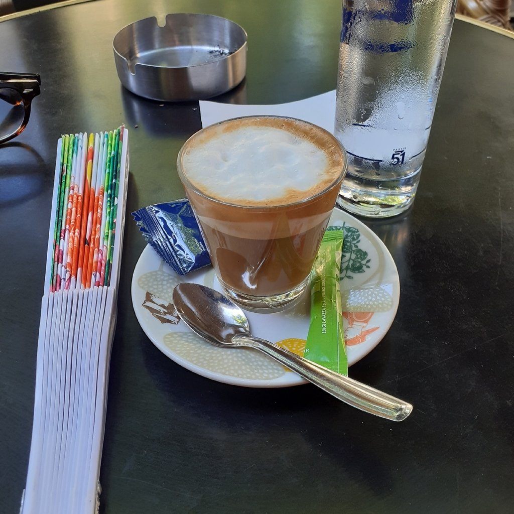 a street sign sitting on the side of a road